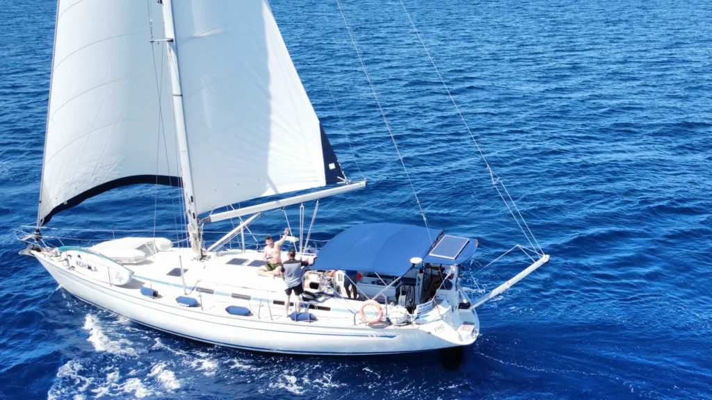 Kyknos Bavaria 50 sailing yacht cruising under sail in the Sporades islands